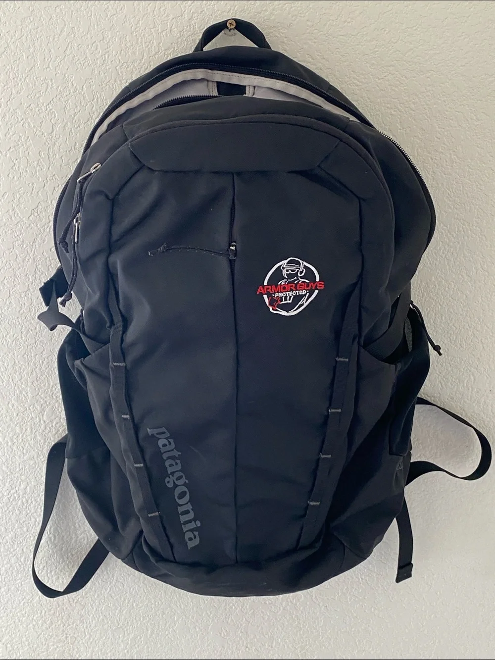 Patagonia Refugio 28L Black Backpack with Armor Guys Embroidery